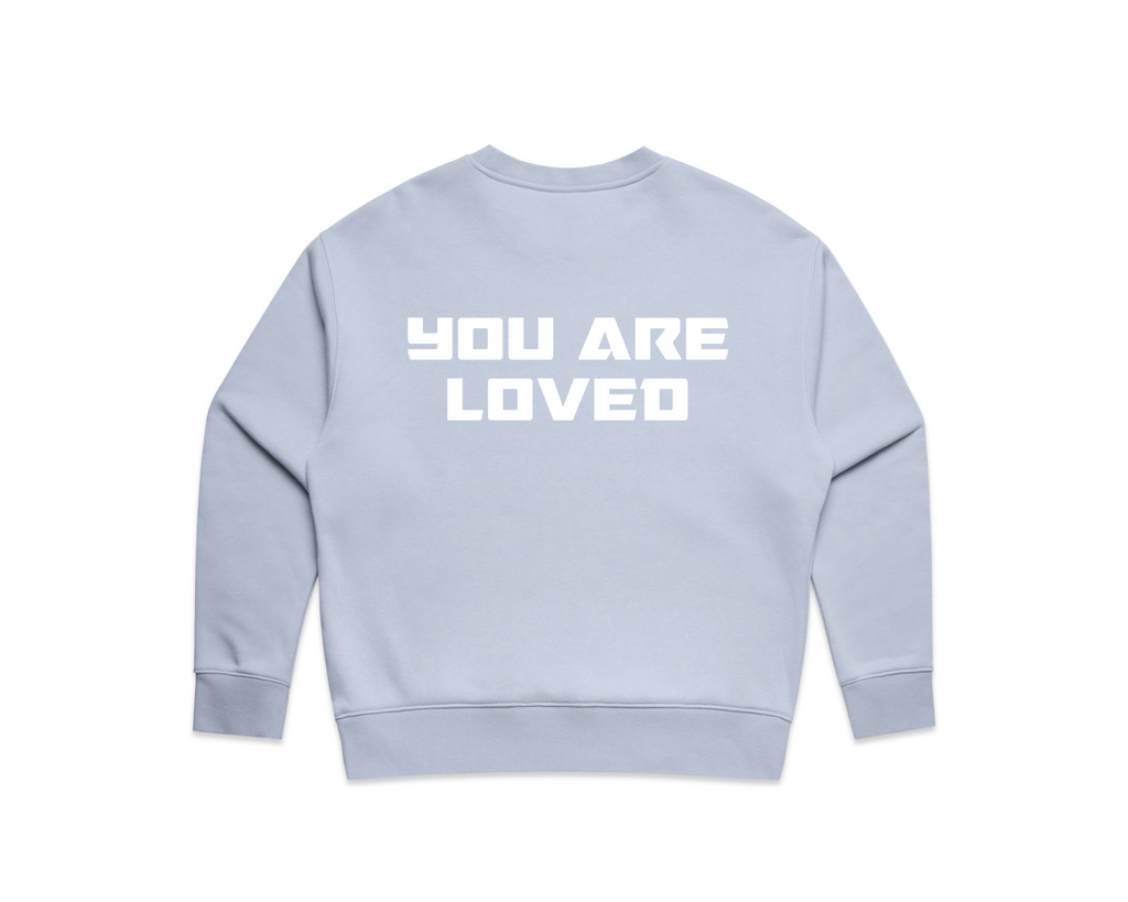 Light blue fleece crew neck sweatshirt with bold white text 'YOU ARE LOVED' on the back, part of DMROZE WOMEN'S PRINTED CREW NECKS collection